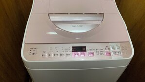 A white Sharp washing machine with a control panel featuring multiple buttons and a display screen. - W210 Tokyo Monthly Rental - Sakurashinmachi Single (Setagaya City)