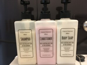 Hair dryer, bidet, towels, soap