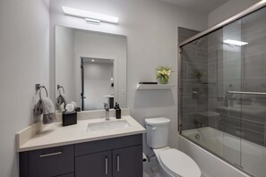 Shower, hair dryer, shampoo