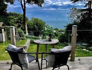 Outdoor dining - Stunning property with sea views and swimspa

 (St. Lawrence)