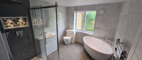Shower, hair dryer, towels, soap