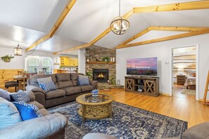 Signature House, 3 Bedrooms, Non Smoking, Mountain View | Living room | 65-inch Smart TV with digital channels, fireplace - Cozy Cove (Sevierville)