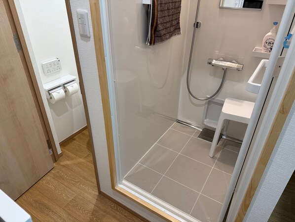 Hair dryer, towels, soap, shampoo