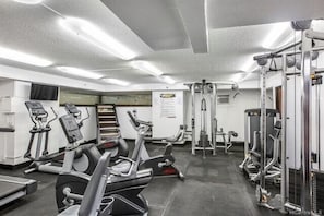 Stay fit on the go with our fully equipped gym featuring treadmills, weight machines, and free weights.