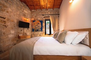 Standard-huone | Ylelliset vuodevaatteet, minibaari (osa tuotteista ilmaisia)