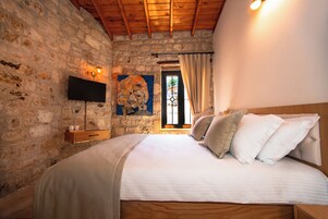 Quarto standard | Roupas de cama premium, frigobar (abastecido com alguns itens grátis)