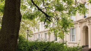 A building with a classical architectural style, featuring arched windows and a symmetrical facade. - Host Stay Princes Place Hideaway IV (Liverpool)