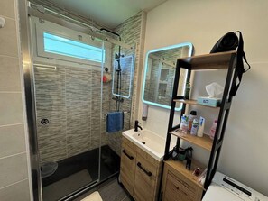 Shower, hair dryer, towels, soap