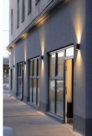 Stylish building with large windows and a clean design.