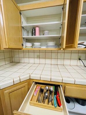 Fridge, microwave, stovetop, coffee/tea maker