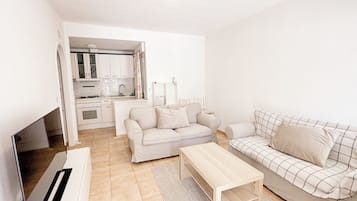 Apartamento | Área de estar | TV