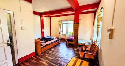TRIPLE BED DELUXE ROOM
