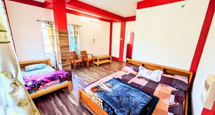 TRIPLE BED DELUXE ROOM