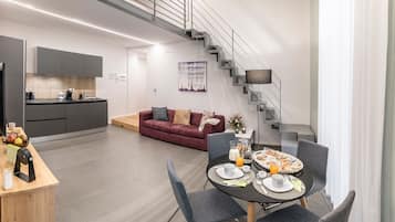 Appartamento Green | Área de sala de estar | Televisión LED, películas de estreno y películas con cargo
