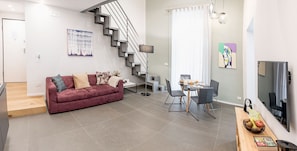 Appartamento Green | Área de sala de estar | Televisión LED, películas de estreno y películas con cargo 