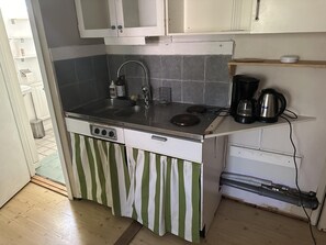 Apartamento | Cozinha privada | Geladeira, micro-ondas, fogão, cooktop