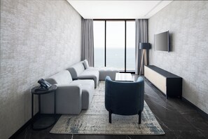 Apartment, 1 Bedroom, Sea View | Living area | Flat-screen TV