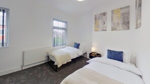 Casa | 2 quartos, Wi-Fi de cortesia, roupa de cama