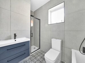 Apartment | Bathroom | Separate tub and shower, deep soaking tub, hair dryer, towels