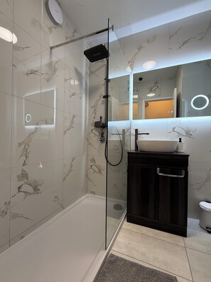 Hair dryer, towels, soap, shampoo