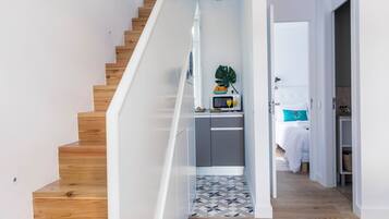 2 bedrooms, desk, iron/ironing board, travel crib