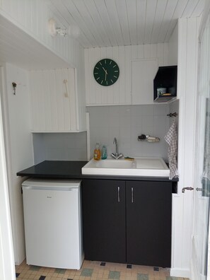 Dutxa, assecador de cabells, tovalloles i sabó