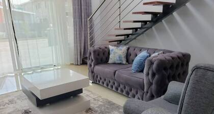 Glint Airport Holiday Home