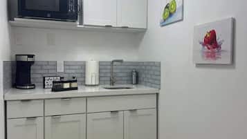 Microwave, stovetop, coffee/tea maker, toaster