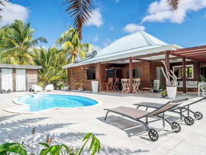 Villa Tyno, with its private pool and surfer's paradise just a few minutes away.