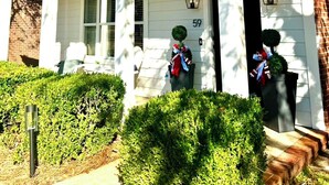 A white two-story house with a porch, number 59, and a mailbox. -     Freshly Remodeled Oxford Retreat 1 Mile to Ole Miss & The Square (Oxford)