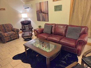 Smart TV, fireplace, table football, books