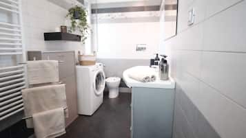 Hair dryer, towels, soap, toilet paper