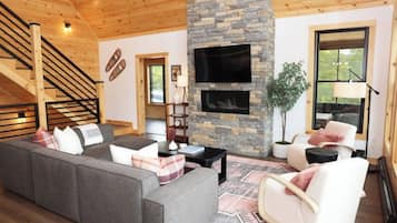 Smart TV, fireplace, books