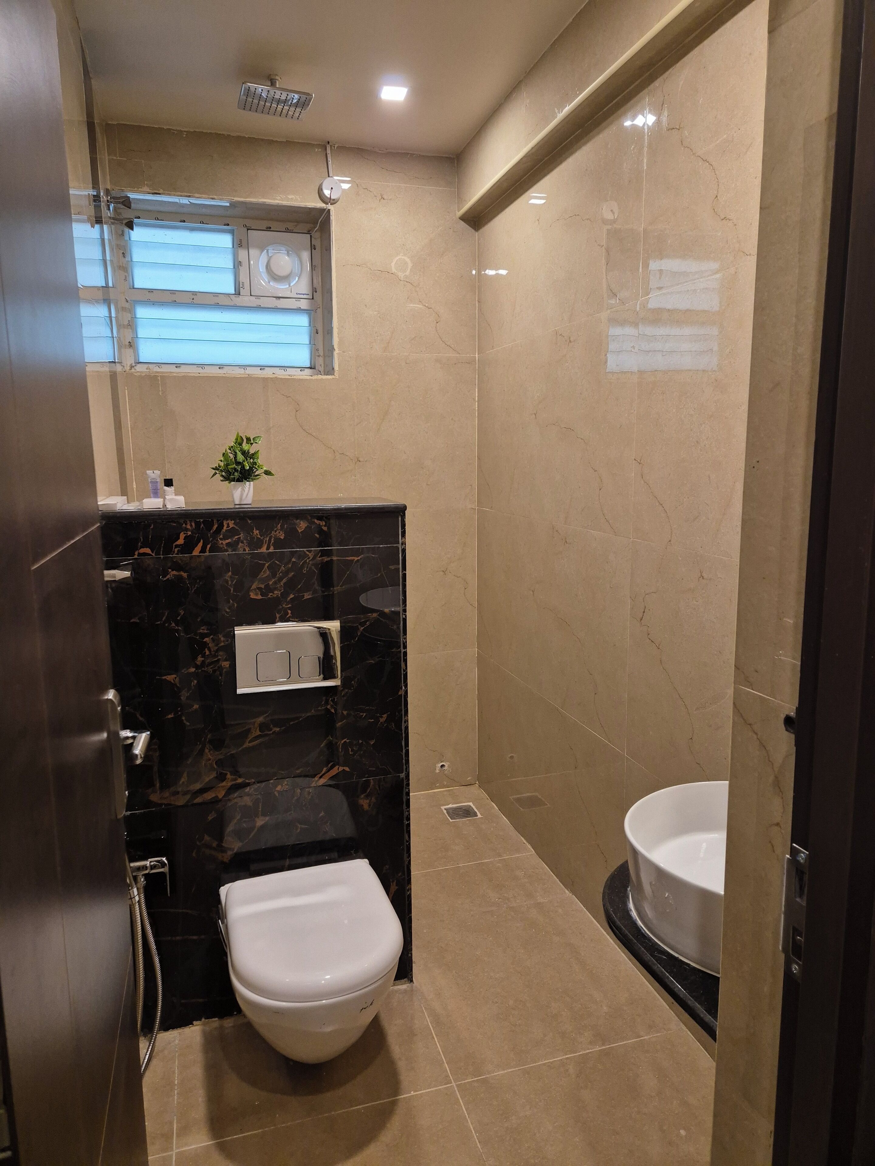 Shower, free toiletries, towels, soap