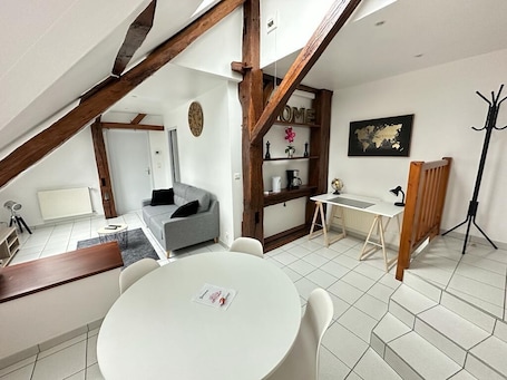 Living area. Cosy apartment, close to all amenities yet in a quiet location