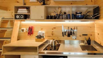 Mini-fridge, stovetop, cookware/dishes/utensils, paper towels