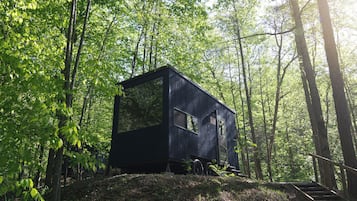 1 bedroom, desk, laptop workspace, bed sheets