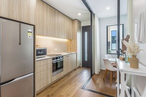 Apartment, 2 Bedrooms | Private kitchen | Fridge, microwave, oven, dishwasher