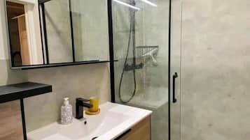 Shower, hair dryer, soap, shampoo