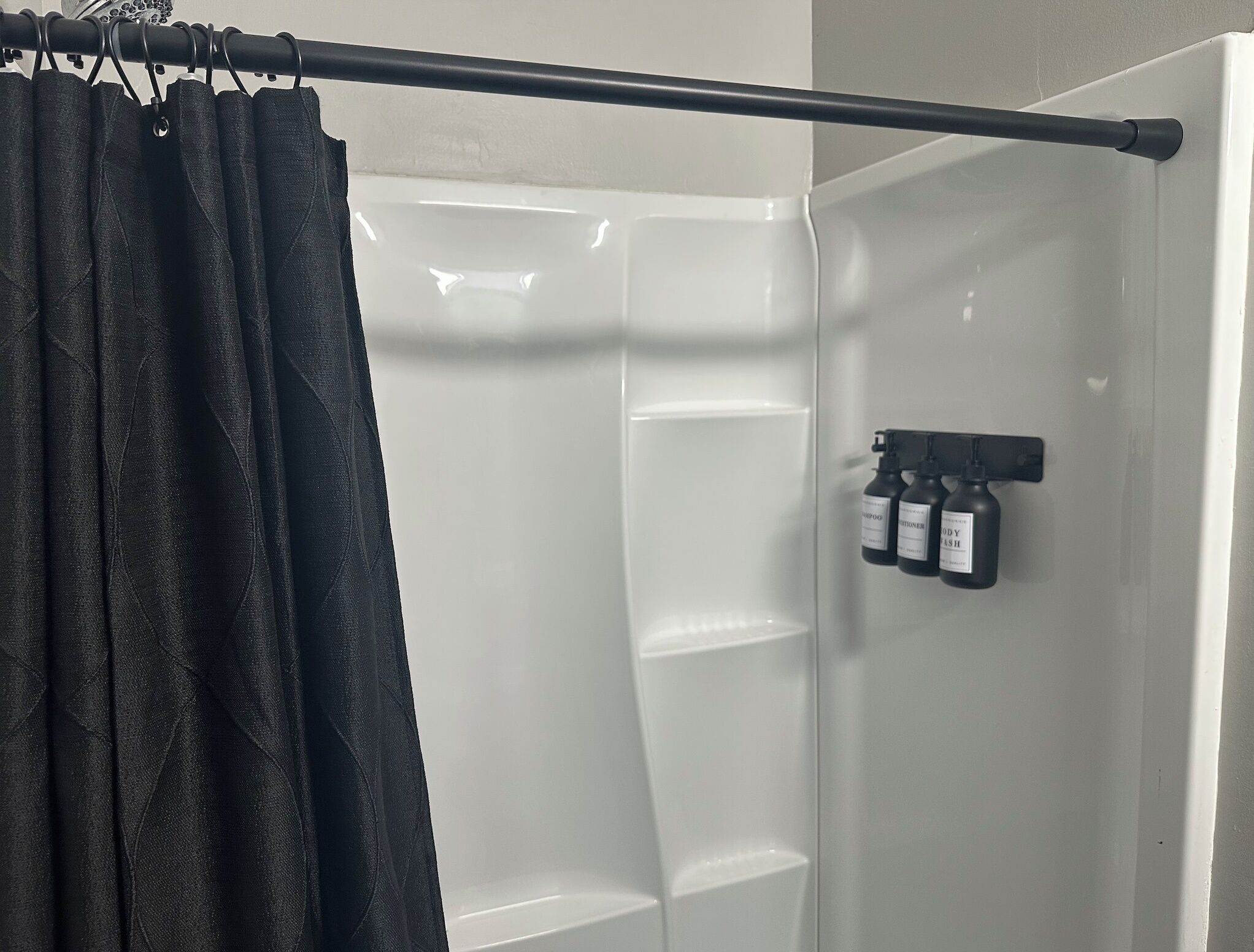 Shower, hair dryer, towels, shampoo