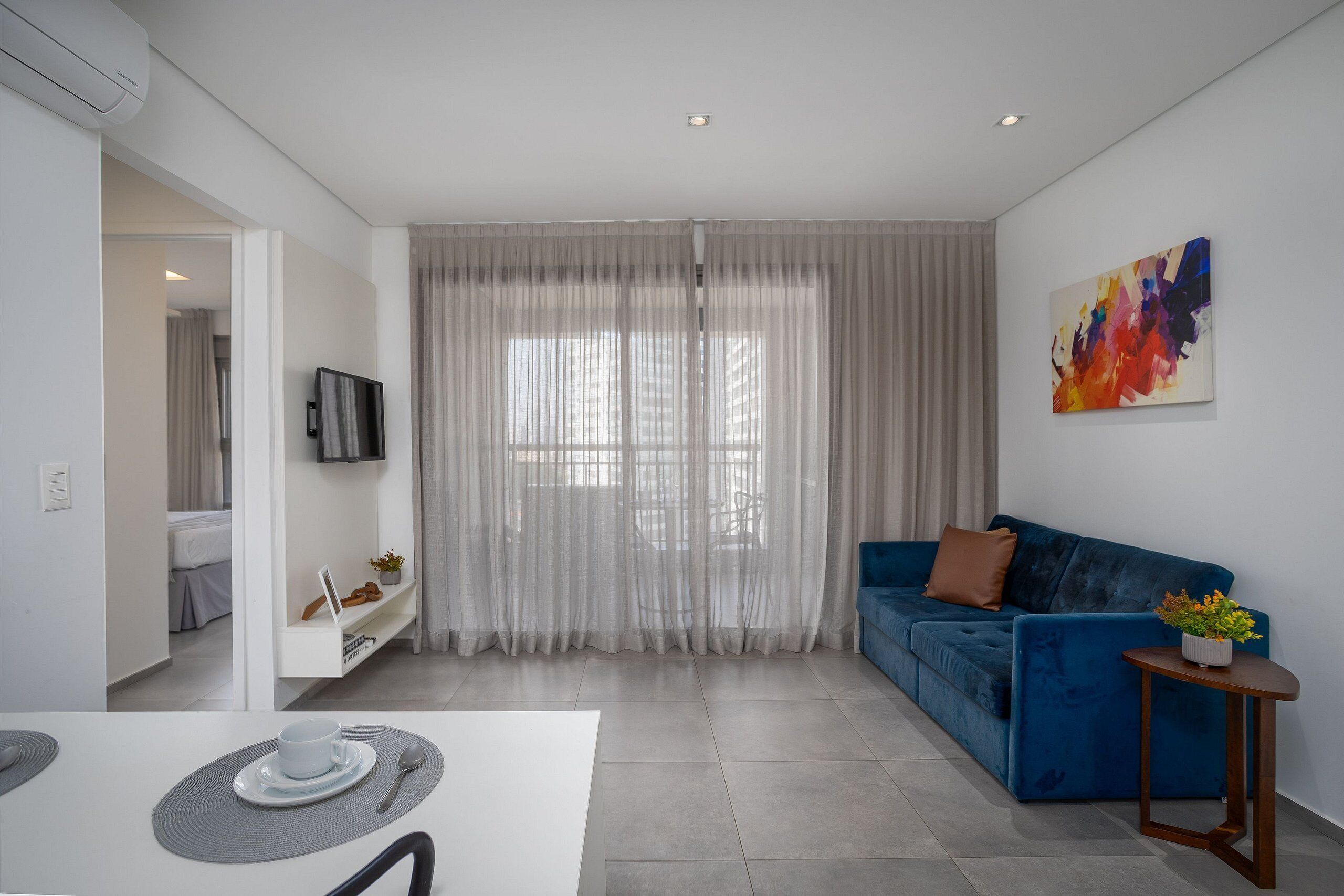 City Apartment | Living area | TV