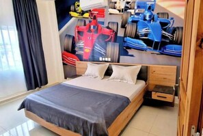 Enjoy a restful stay in this stylish room with a comfortable bed, large window, and shelf.