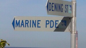 A directional signpost with "DENING ST" and "MARINE PDX" directions. - Welcoming 2-bedroom apartment in The Entrance (The Entrance)