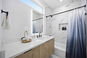 Hair dryer, towels, soap, toilet paper