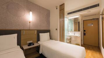 Hypo-allergenic bedding, in-room safe, desk, laptop workspace