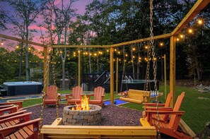 Outdoor spa tub - Pocono Dream House! Heated Pool, Fire Pit, Bowling, Mini Golf! (East Stroudsburg)
