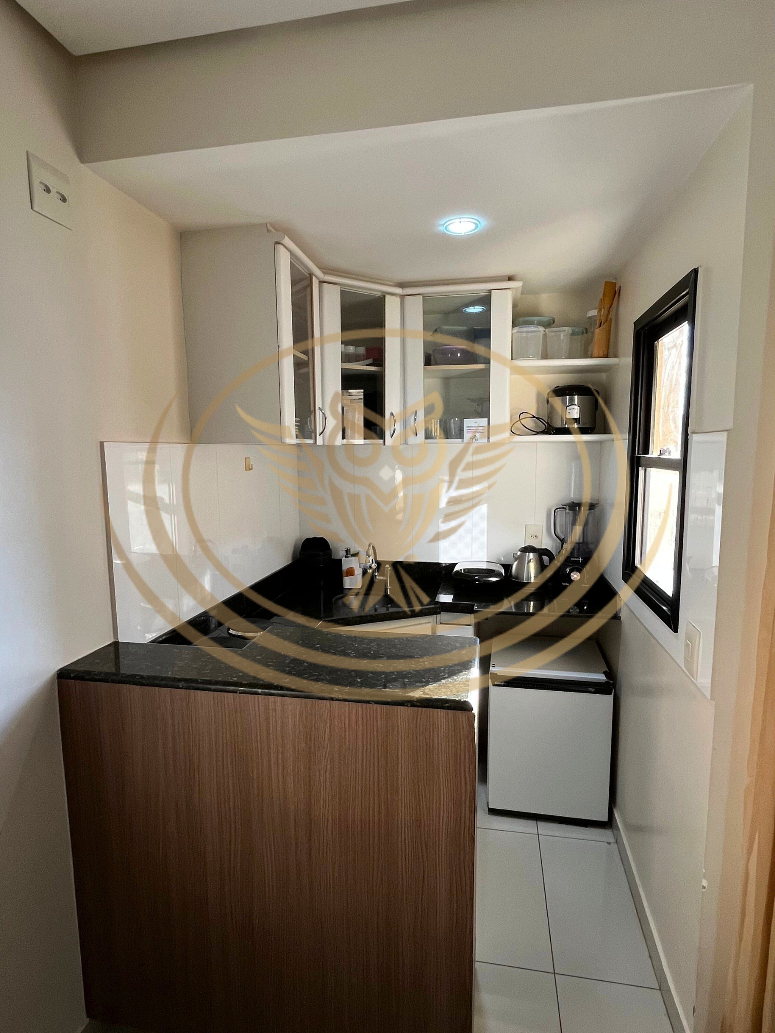 Basic Apartment | Private kitchen | Microwave, cookware/dishes/utensils, dining tables
