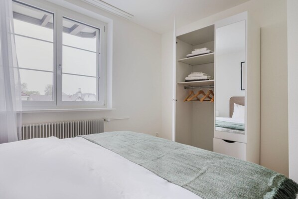 2 dormitorios, tabla de planchar con plancha, wifi y ropa de cama