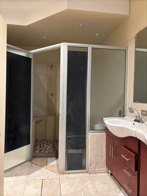 Shower, hair dryer, towels, soap