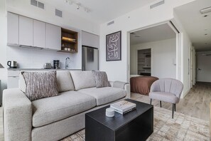 TV, stereo - Superb NoMa 1BR w/ Pool, Gym, EV Charging & Spa (Washington, D.C.)